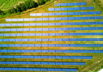 Aerial view of Solar panels Photovoltaic systems in italy, industrial pattern landscape