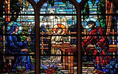 Holy Family, stained glass windows in the Saint Laurent Church, Paris, France © zatletic