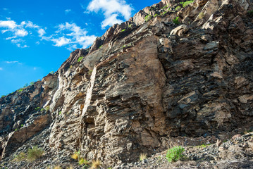Stone rocks on the background of blue sky