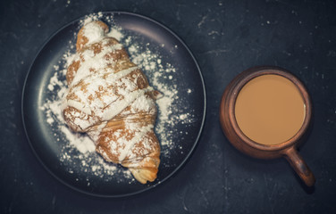 Morning coffee with croissant