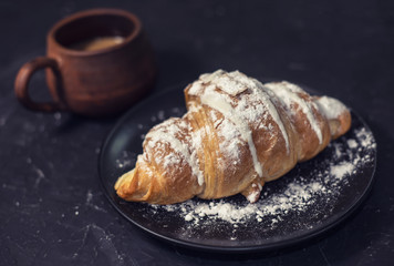 Morning coffee with croissant