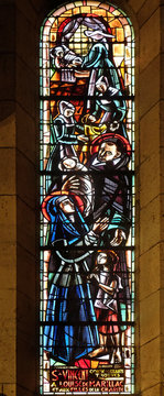 St Vincent de Paul and Louise of Marillac, stained glass window in Basilica of the Sacre Coeur, dedicated to the Sacred Heart of Jesus in Paris.
