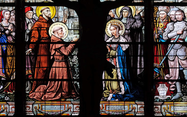 St. Francis of Assisi, St. Anthony of Padua and St.. Elizabeth, stained glass window in Saint Eustache church in Paris, France