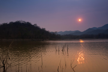 Villagers are catching fish by fish trap (net trap) in reservoir