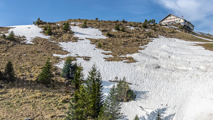 Switzerland, Beautiful scenic view on snow Alps peaks with blue sky and white clouds above