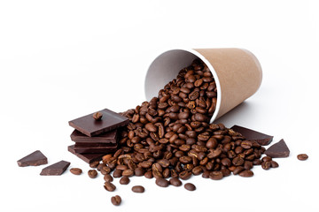 Craft coffee cup full of coffee beans wih chocolate on white background