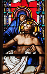 Fototapeta premium Deposition from the Cross, stained glass window from Saint Germain-l'Auxerrois church in Paris, France 