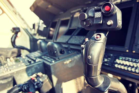 Helicopter flight control. Cyclic of helicopter.  Helicopter s76 cockpit. Close up flight control of s76 helicopter.