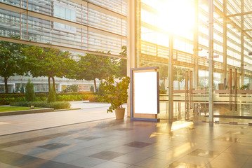 Modern glass facade business office building exterior with floor ,evening scene .