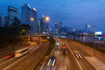 traffic in downtown district of Hong Kong city at dusk