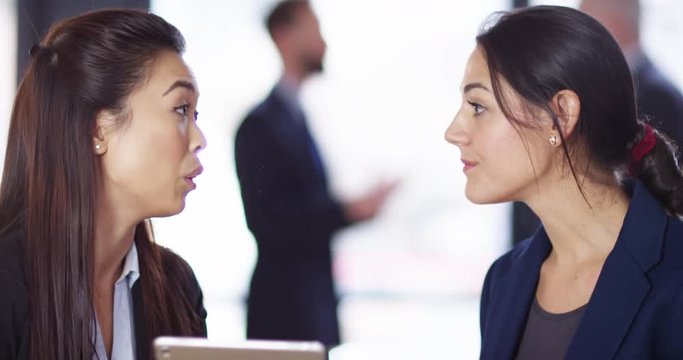 4K Professional PR executive getting stressed in a meeting with a difficult client. Slow motion.