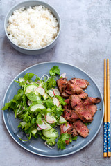 Asian beef  with cucumber salad