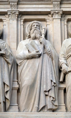 Fototapeta premium Apostle, statue on the facade of Saint Augustine church in Paris, France