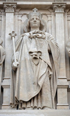 Fototapeta na wymiar Saints Louis, statue on the facade of Saint Augustine church in Paris, France 