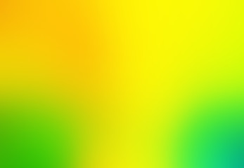 Colourful blurred yellow, green and orange gradient background.