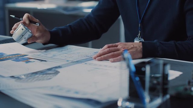 Heavy Industry Engineer Draws Engine Concept Blueprint. Engineering Bureau and Industrial Design Agency with Various Robotic, Architectural and Machinery Components