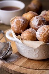Tasty Homemade Cottage Cheese Donuts in Sugar Powder Wooden Background Donuts Close Up Vertical
