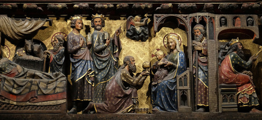 Intricately carved and painted frieze inside Notre Dame Cathedral depicting Adoration of the Magi,...