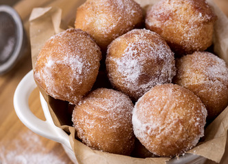Tasty Homemade Cottage Cheese Donuts in Sugar Powder Wooden Background Donuts Close Up