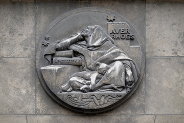 Averroes, was a medieval Andalusian polymath. He wrote on logic, philosophy, medieval sciences of medicine, astronomy, physics. Stone relief at the building of the Faculte de Medicine Paris