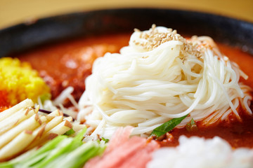 Korean white thin noodle with hot sauce