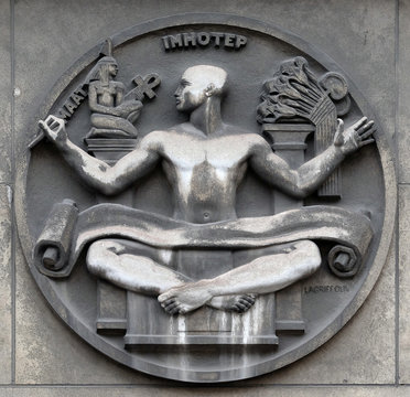 Maat and Imhotep. Stone relief at the building of the Faculte de Medicine Paris, France