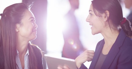 4K Excited professional woman having a discussion with party event planner. Slow motion.