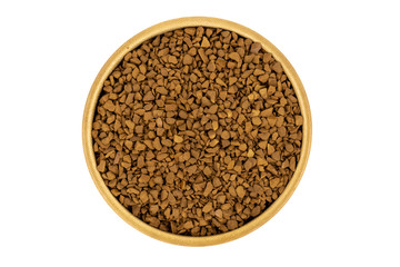 Granulated coffee in a wooden plate (cup) isolated on white background
