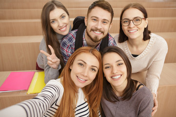 Fototapeta premium Diverse group of cheerful college students on campus