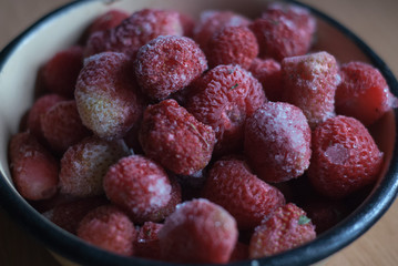 frozen strawberries in a bowl, strawberries in frost,