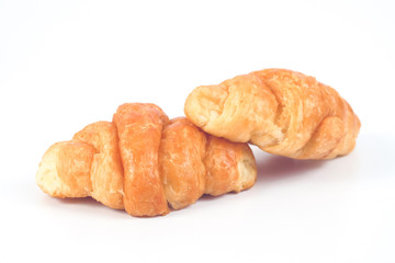 Home made fresh croissant on white background.