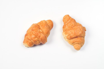 Home made fresh croissant on white background.