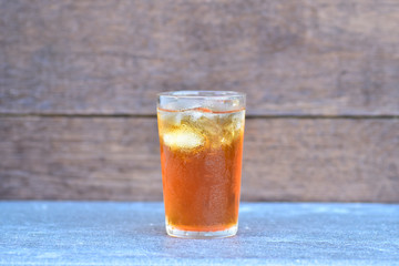 iced tea on blur wood background