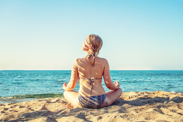 Fototapeta na wymiar Happy girl relaxing on tropical sea beach