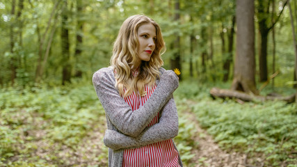 Obraz premium Outdoors portrait of beautiful young woman. Selective focus.