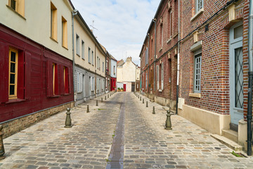 Fototapeta na wymiar Empty narrow street in old town of Amiens