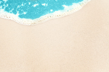 Naklejka na ściany i meble Tropical background with white sea beach sand and blue surf texture background