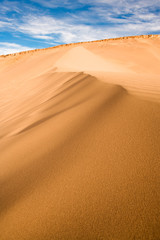 Fototapeta na wymiar Sand dune at Valle de la Muerte (Spanish for Death Valley), Los Flamencos National Reserve, San Pedro de Atacama, Atacama desert, Antofagasta Region, Chile, South America