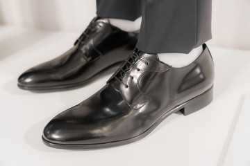 elegant shoes for man in a clothing store