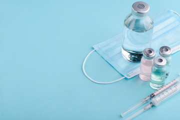 Vials, bottle, syringes and mask