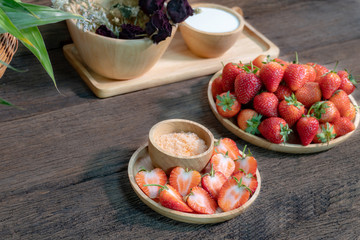 Fresh strawberries on wooden table