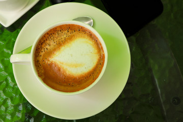 Coffee cup on the table