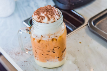 Ice thai tea with milk, traditional Indian drink is iced tea or chai masala, Milk tea, Orange tea