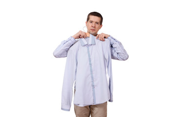 the man tries on a coat hanger with a shirt on a white background