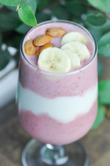 strawberry smoothie or strawberry yogurt with banana topping