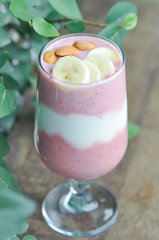 strawberry smoothie or strawberry yogurt with banana topping