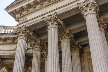 Supreme Court of the United States building front entrance with a scenic view of columns and steps under bright summer sun in Washington DC, USA