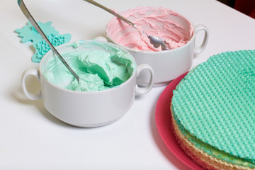 Cream of different colors for decorating waffle cake. Round wafer cakes of different colors. For making waffle cake.