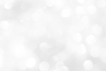 A brilliant blurry white background for a festive mood. Template for greeting card for entertainment.