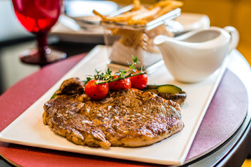 L’Entrecote de Boeuf 200 days grain fed Angus rib eye with a dense brandy cream sauce and crispy fries.